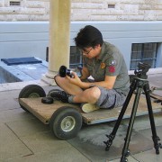 Camera operator on dolly