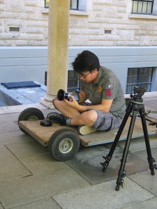 Camera operator on dolly Camera operator on dolly